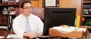 Attorney Courie with a Computer